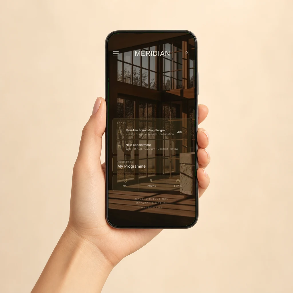 A hand holding a phone displaying the Meridian Health app home screen