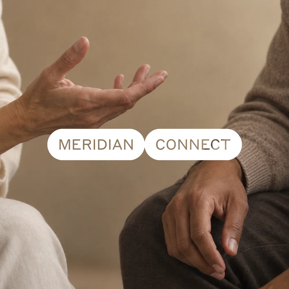 Two people in conversation for Meridian Connect