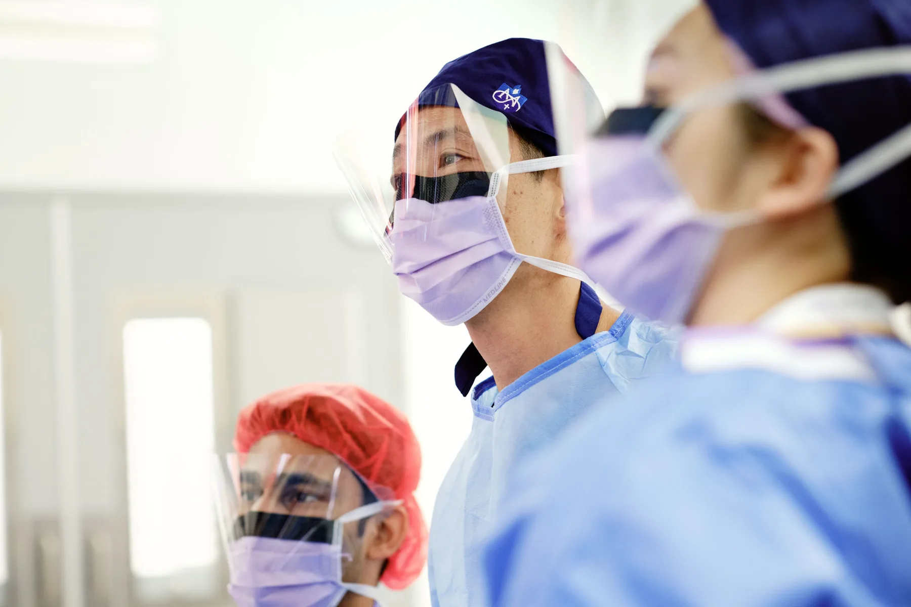 Surgeons working together in an operating theatre