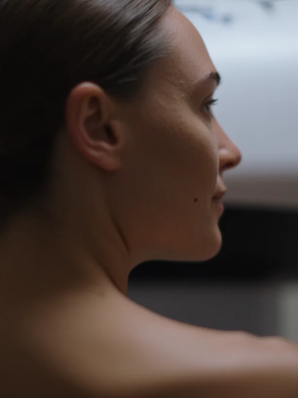 Patient in profile during a clinical appointment